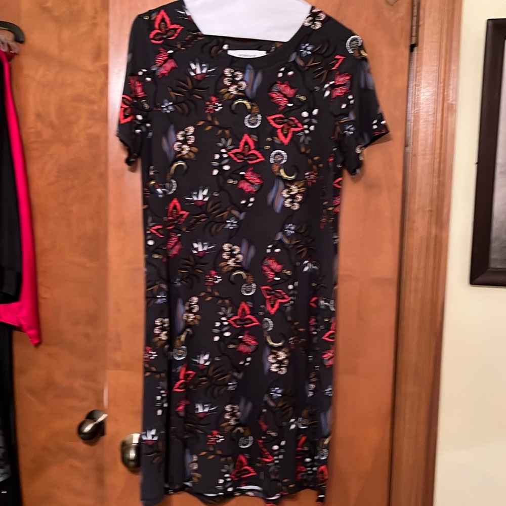 Workshop Dress in dark gray background and multicolor floral design.